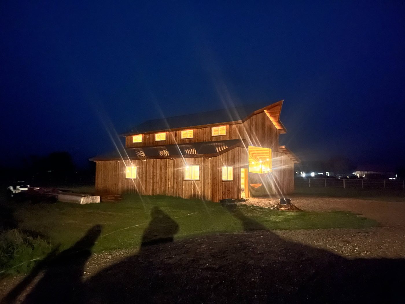 Custom barndominium at night